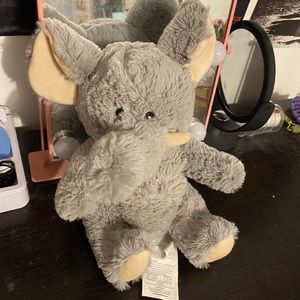 Gray elephant stuffed animal with heating pad inside